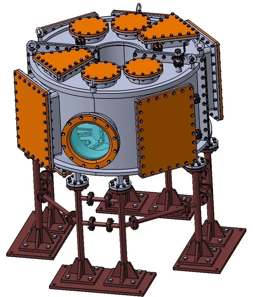 Computer model of the PRAGYA tokamak vacuum vessel with orange port covers, a viewing window and four support legs